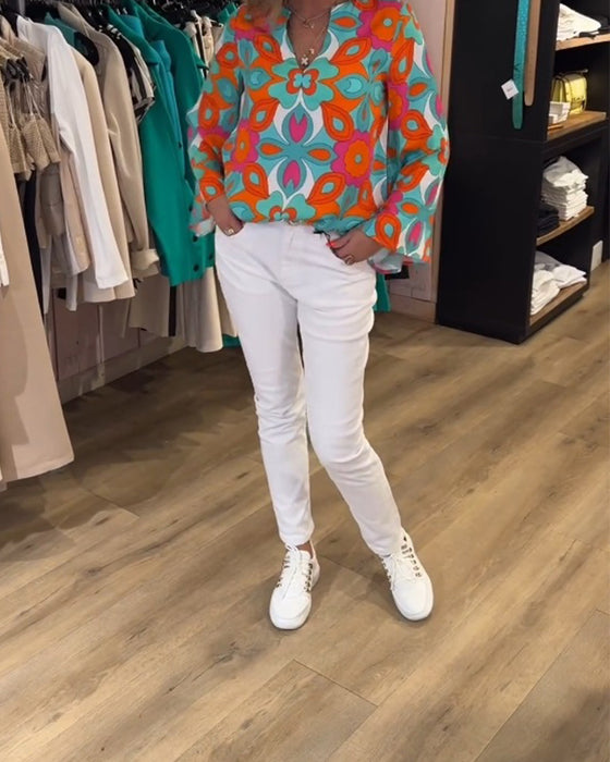 Blus med lösa, mångsidiga stilar och tryck