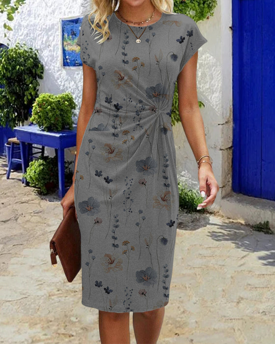 Blommig klänning med korta ärmar