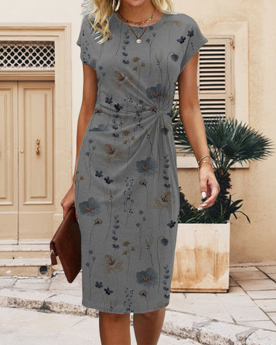 Blommig klänning med korta ärmar