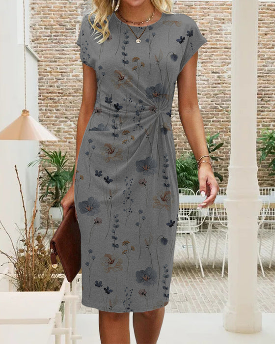 Blommig klänning med korta ärmar