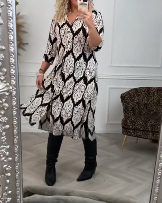 Lapelklänning med tryck i sidled