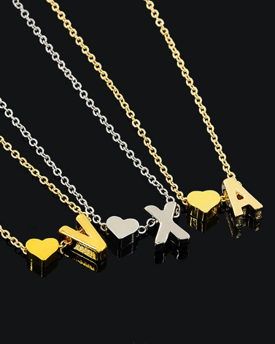 Enkelt persika hjärta bokstavshalsband