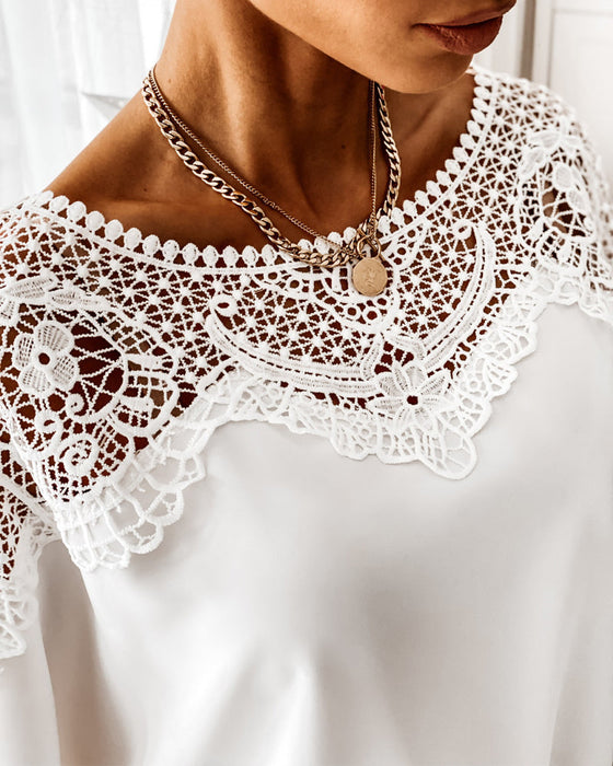 Topp med dolmanärm i spetskrage