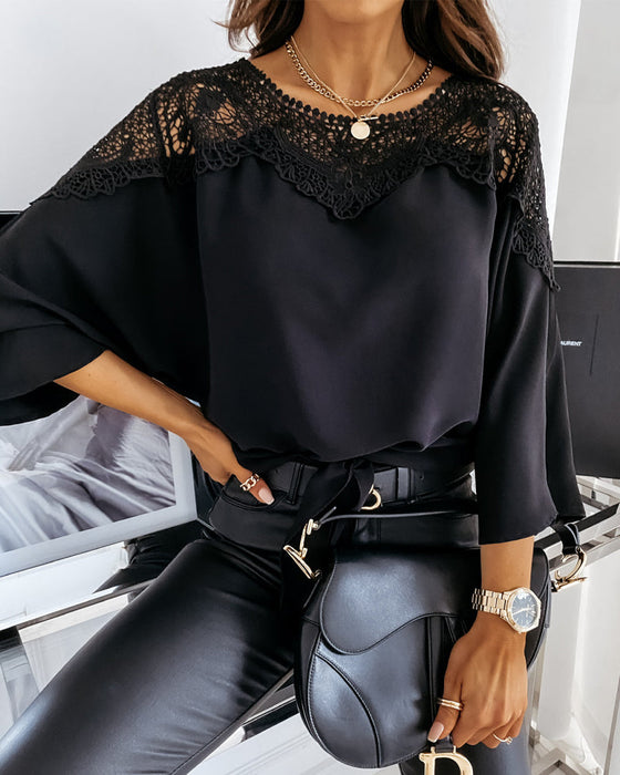 Topp med dolmanärm i spetskrage