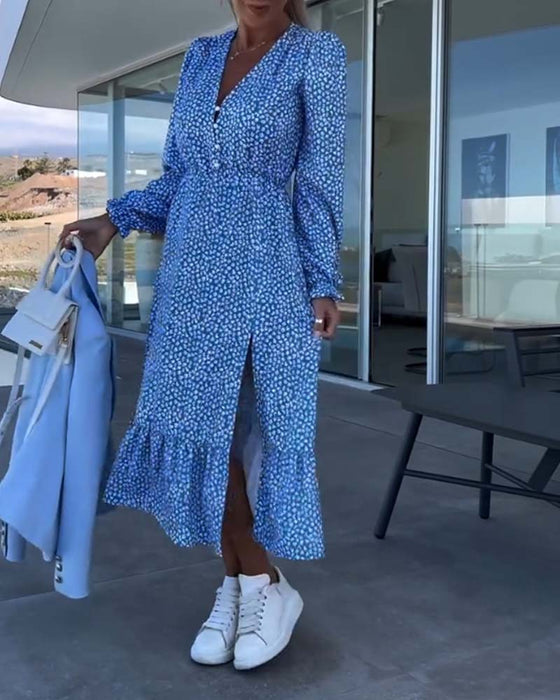 V-ringad blommig patchworkklänning