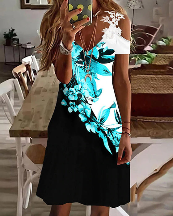 Blommig strandsolklänning