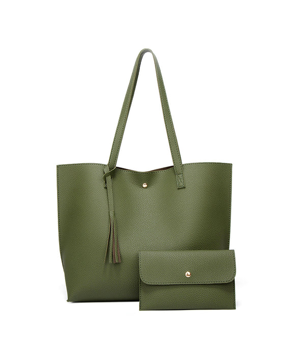 Kapacitet med enfärgad tofs axelväska med stor