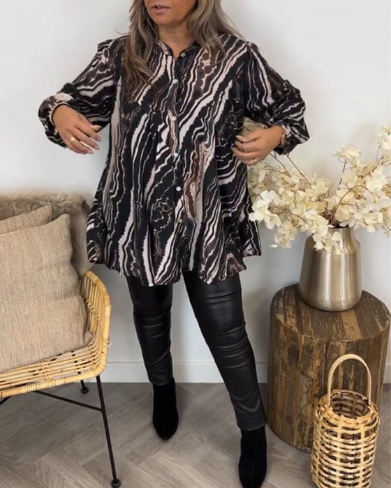 Blus med retrostil och långa ärmar