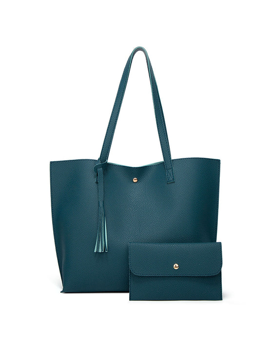 Kapacitet med enfärgad tofs axelväska med stor