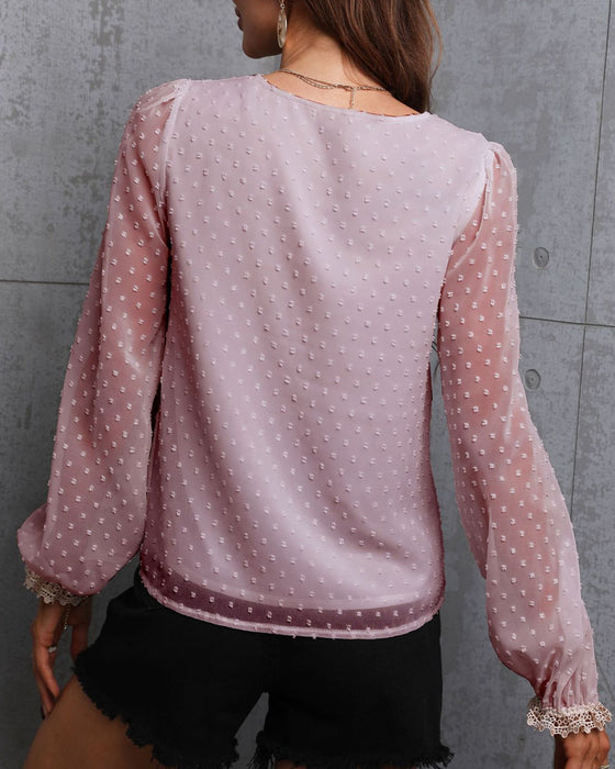 Enfärgad långärmad blusar med spets