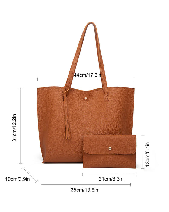 Kapacitet med enfärgad tofs axelväska med stor