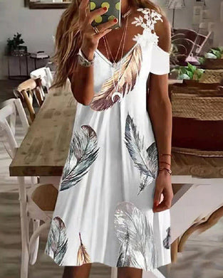 Blommig strandsolklänning