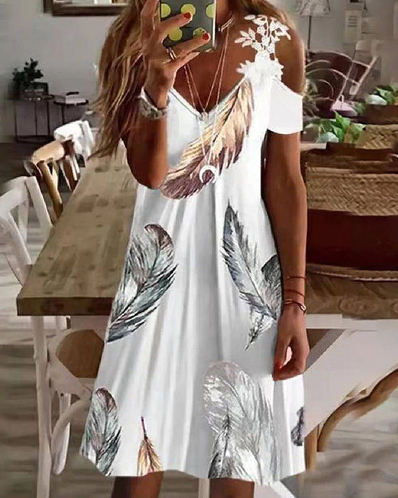 Blommig strandsolklänning