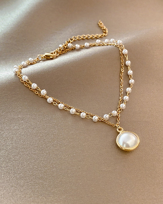 Pärlarmband med kedja i metall