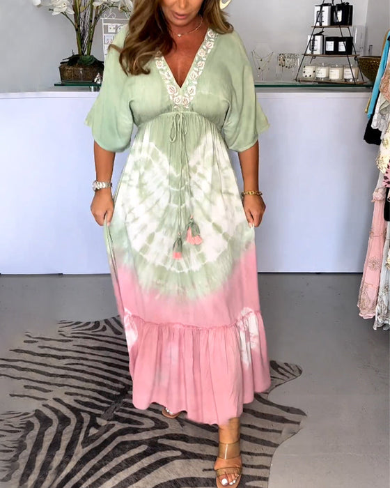 V-ringad klänning med gradienttryck