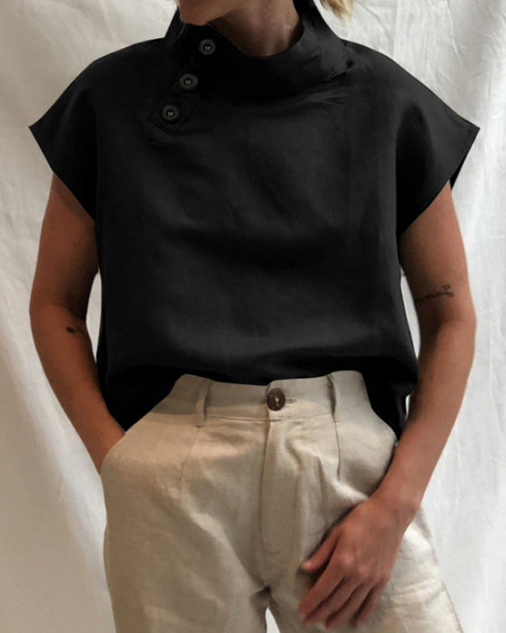 Topp med knappar och stativkrage i bomull och linne