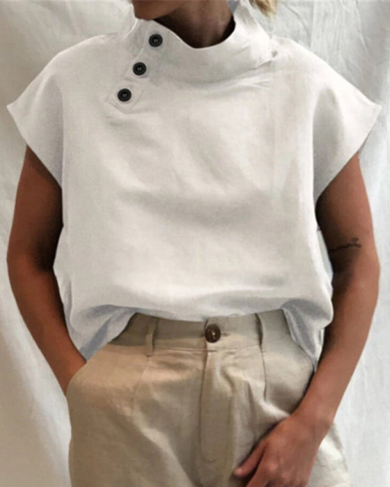 Topp med knappar och stativkrage i bomull och linne