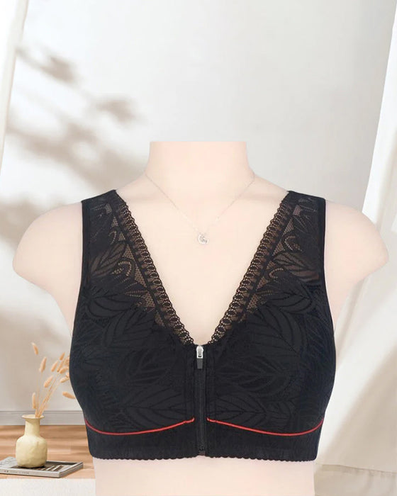 Enfärgade spetsunderkläder med dragkedja fram