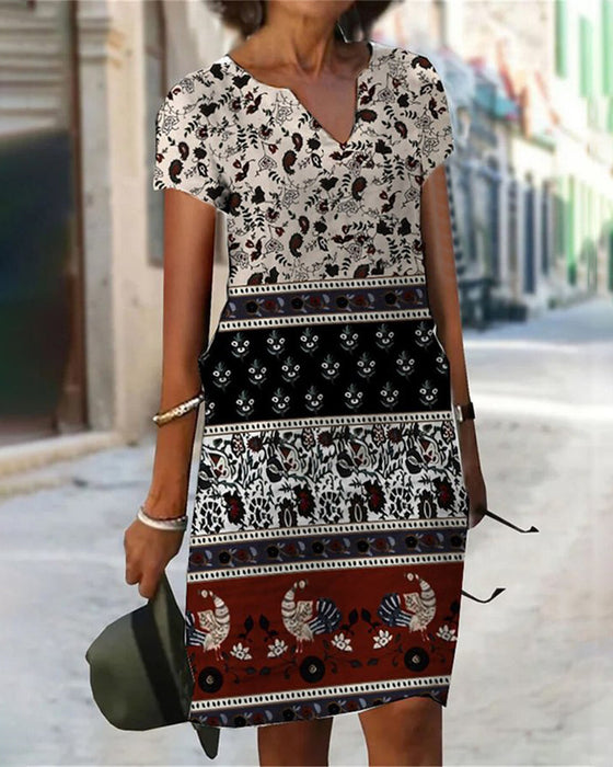 V-ringad klänning med färgblocktryck