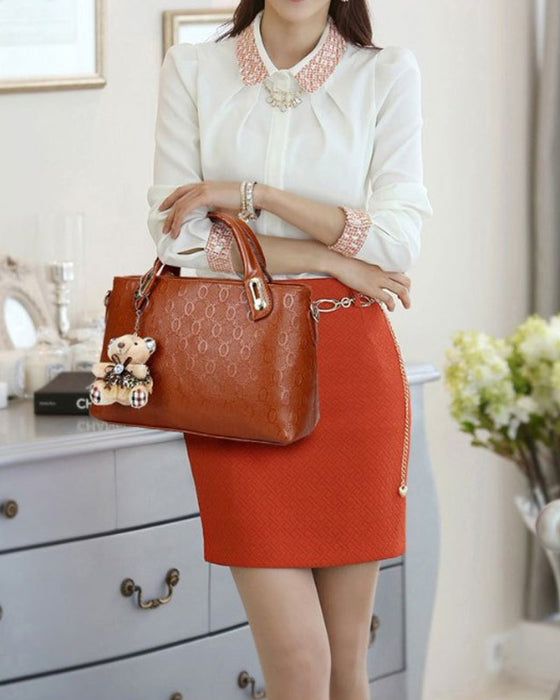 Handväska med fyra delar set