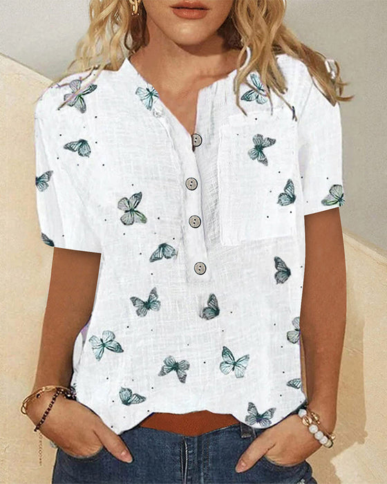 Topp med tryckt med kortärmad