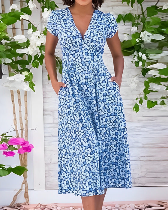 V-ringad klänning med blommönster