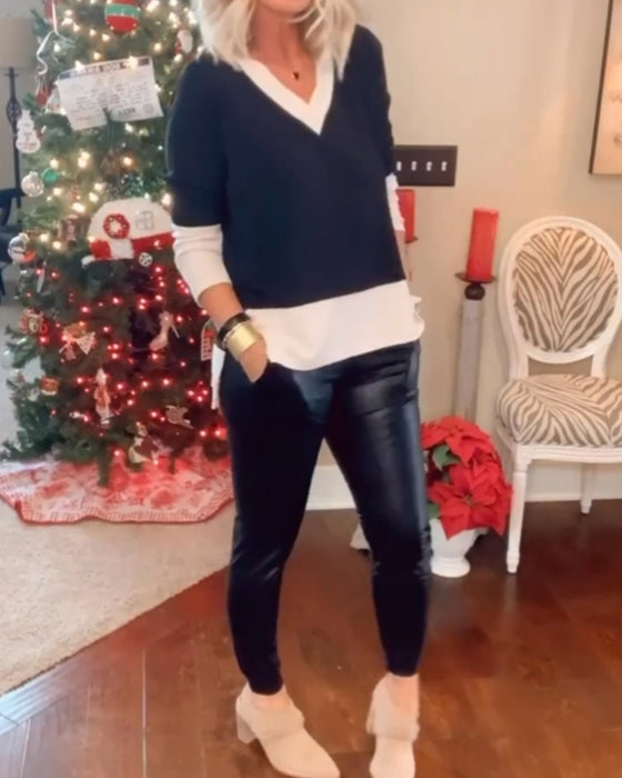 Avslappnad topp med v-ringning och färgblock