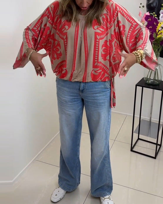 Långärmad avslappnad topp med rund hals med tryck