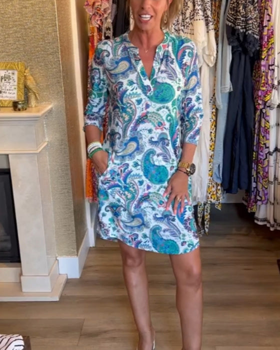 Klänning med 3/4-ärmar och fickor