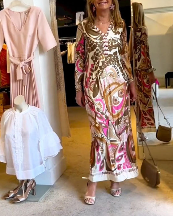 V-ringad lång klänning med tryck