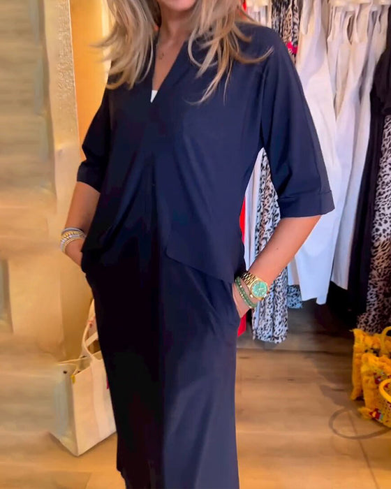 Fickklänning med v-ringning