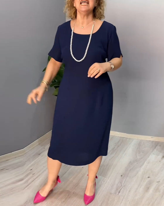 Enfärgad kortärmad elegant klänning