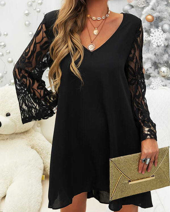 Svart klänning med spetsärmar