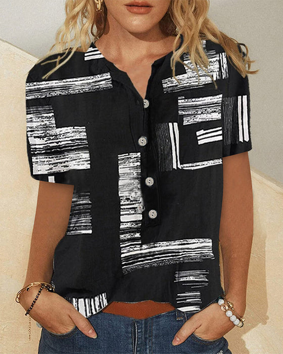 Topp med tryckt med kortärmad