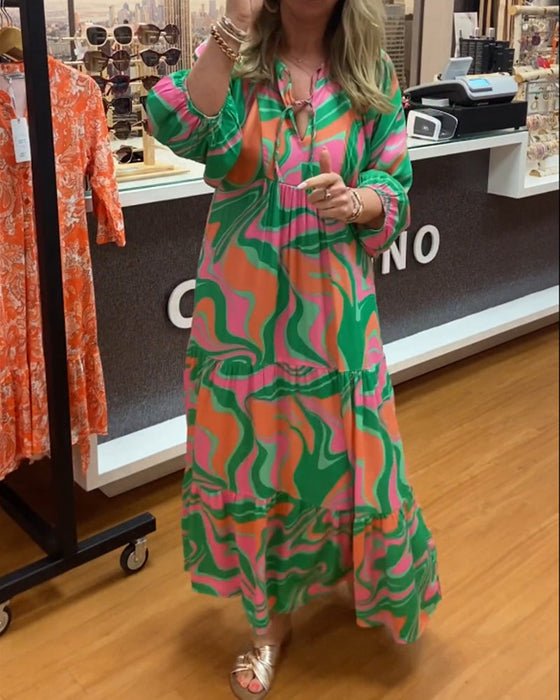 Maxiklänning med v-ringning och tryck