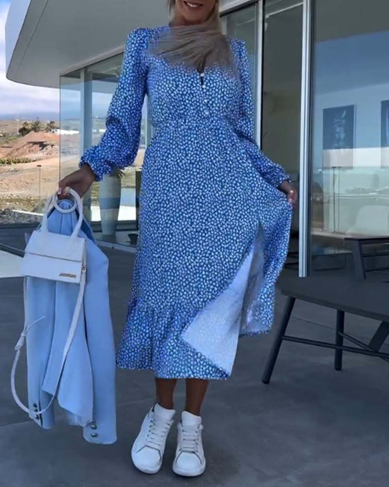 V-ringad blommig patchworkklänning