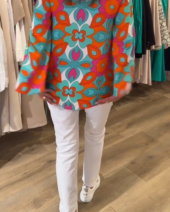 Blus med lösa, mångsidiga stilar och tryck