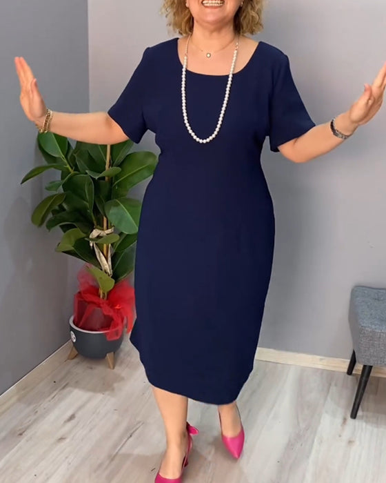 Enfärgad kortärmad elegant klänning