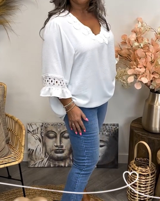 Top med utsvängd ärm och V-ringning