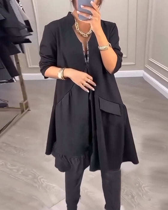 V-ringad Klänning med konstnärlig känsla