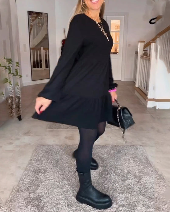 Enkel enfärgad långärmad klänning