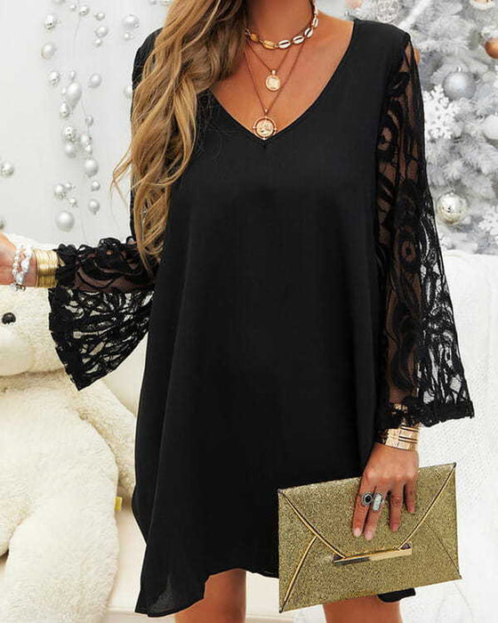 Svart klänning med spetsärmar