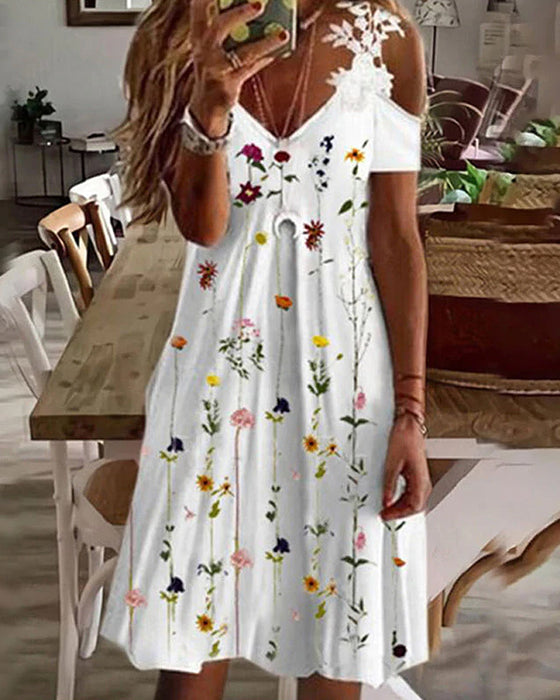 Blommig strandsolklänning