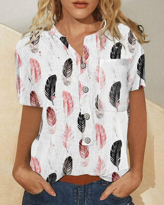 Topp med tryckt med kortärmad