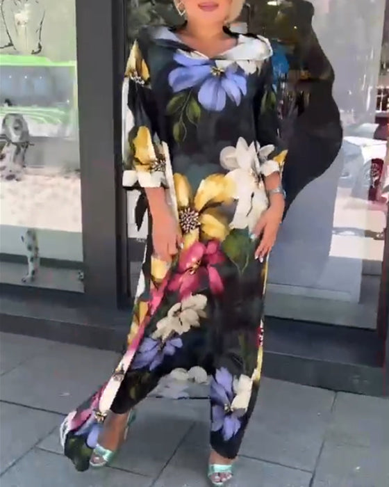 Blommig klänning med 3/4-ärm