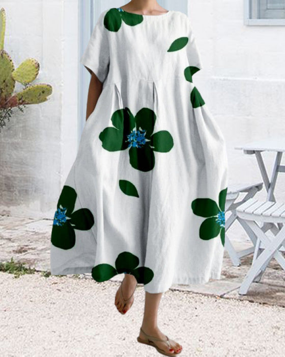 Lös kortärmad klänning med tryck