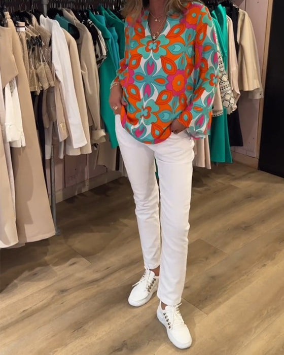 Blus med lösa, mångsidiga stilar och tryck