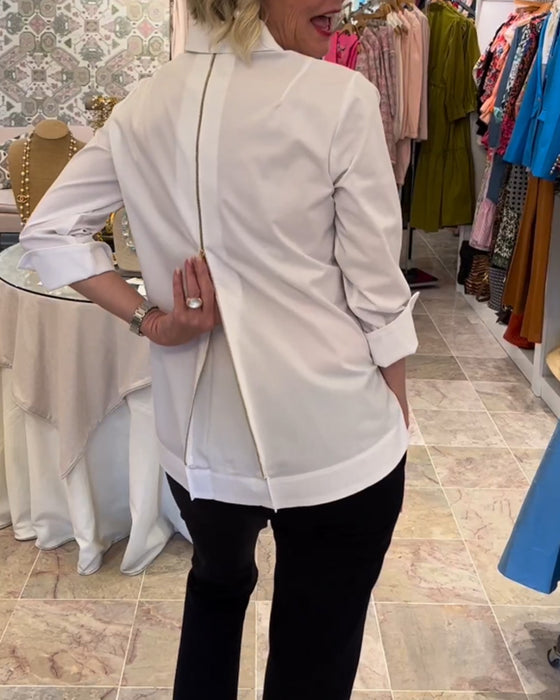 Enfärgad blus med dragkedja