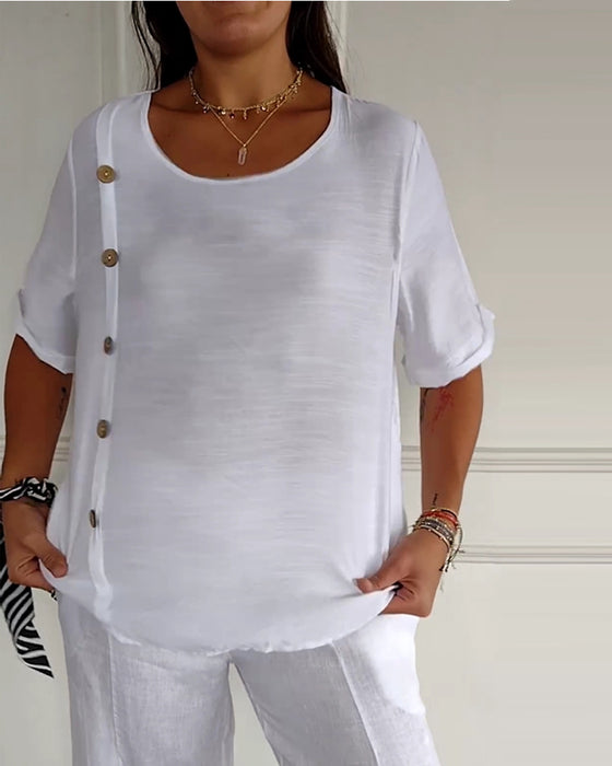 Topp med tunt tyg och knappar