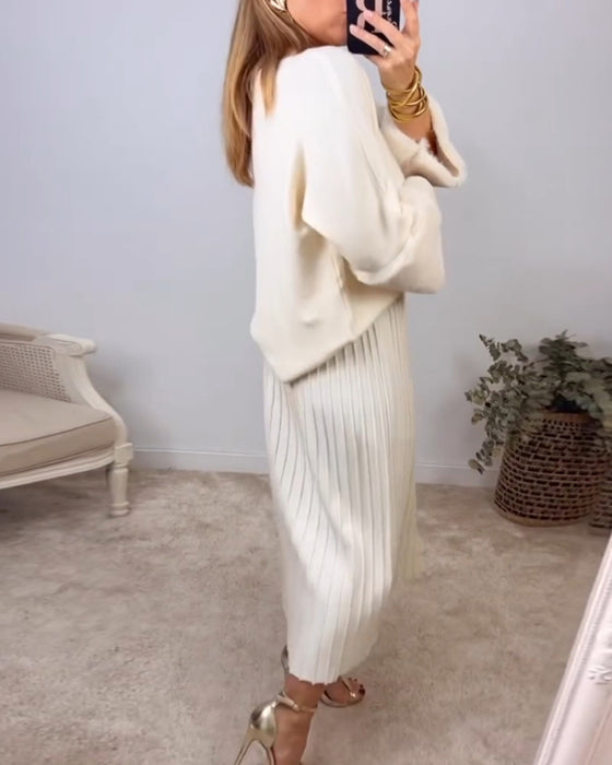 Elegant enfärgad pullover med långa ärmar